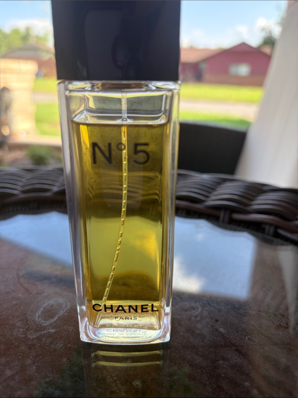 CHANEL — Clear Bottle with Black Cap and Golden Liquid - Picture 7 of 9